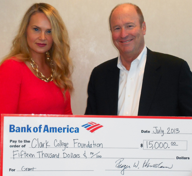Roger Hinshaw, Bank of America's president in Oregon and Southwest Washington, and Monique Barton, senior VP of corporate social responsibility, display the gift for Clark College's Career and Volunteer Service-Learning program.