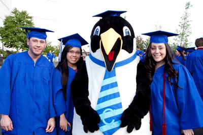 Clark's penguin mascot Oswald with members of the class of 2012