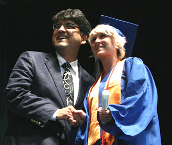 Sherman Alexie congratulates a member of the Clark College class of 2008