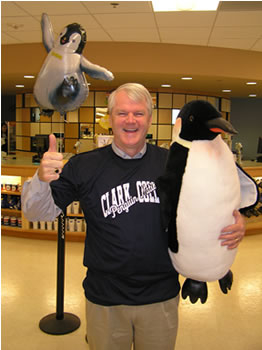 Brian Baird holds a stuffed penguin