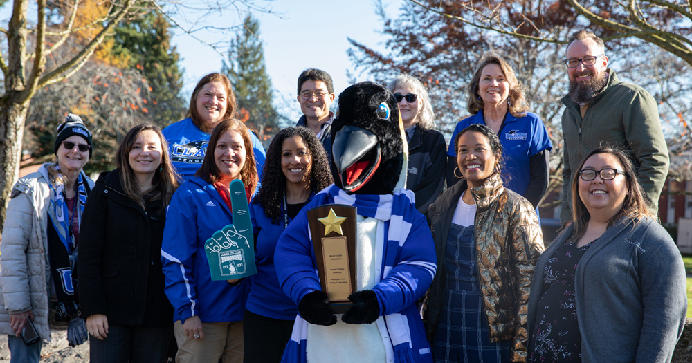 Employees with Walktober Plaque
