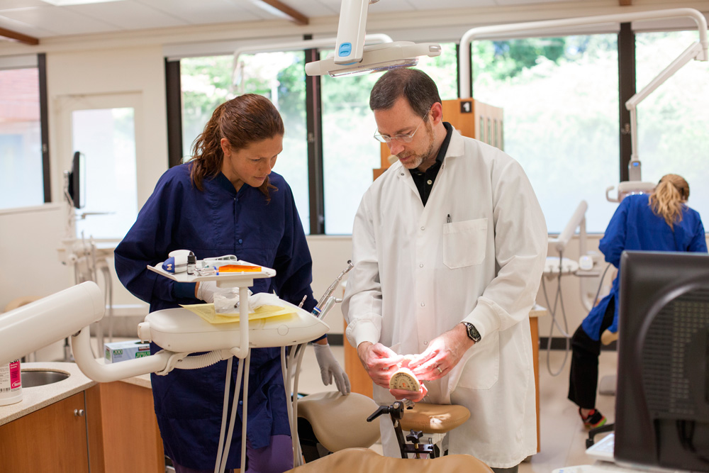 Student and instructor in dental lab