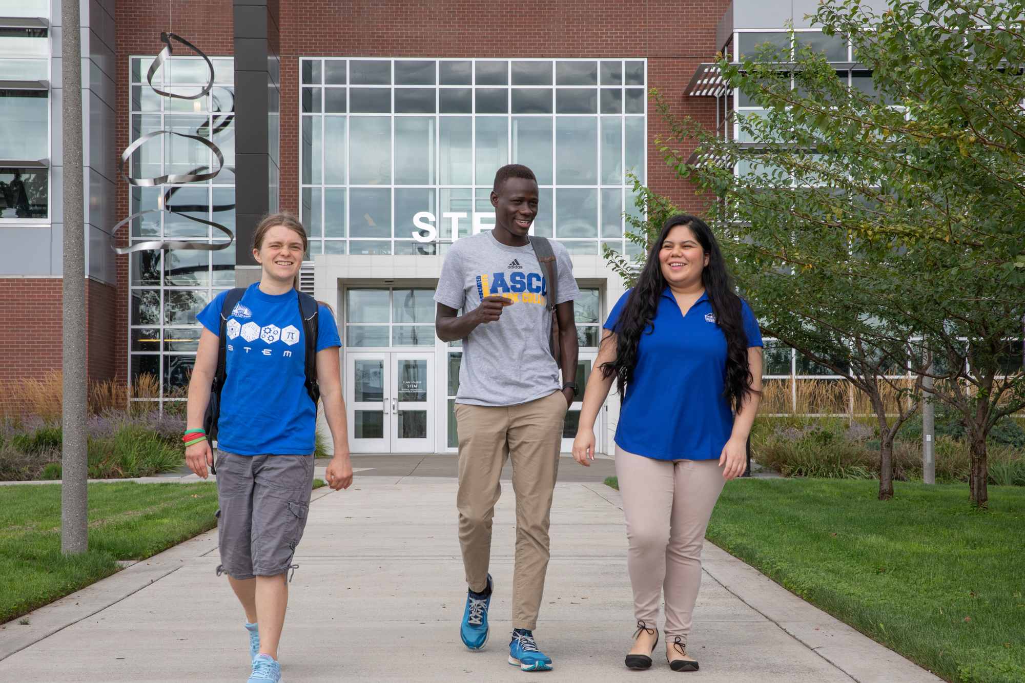 Students walking outside STEM building