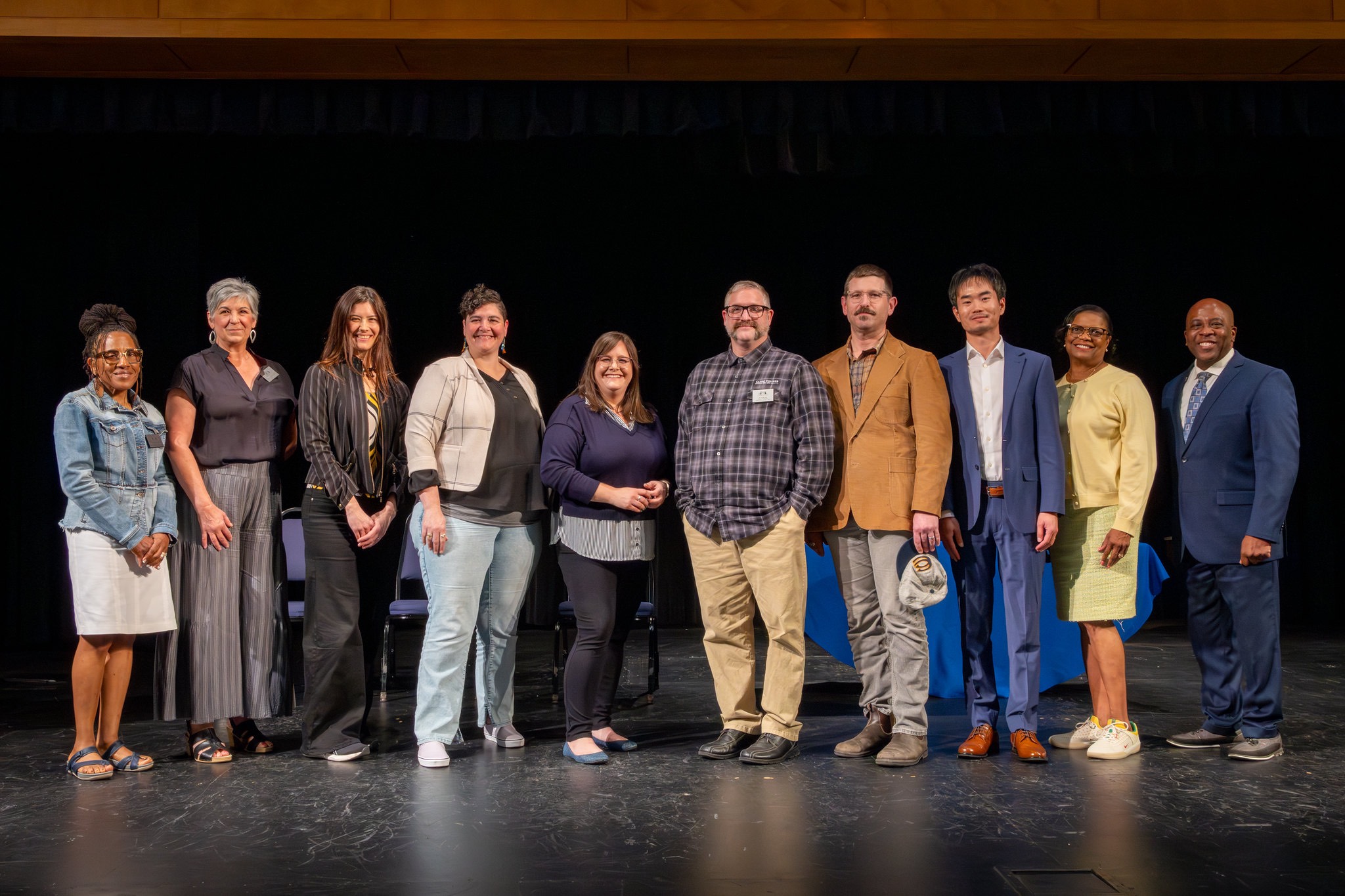 Back row, left to right: Board Chair Marilee Scarbrough, Trustee Jeanne Bennett, Nicole Mottier, Sarah Blanchette, Tina Jenkins, Jeff Rush, Kevin Edwards, Bo Li, President Karin Edwards, Dr. William ‘Terry' Brown