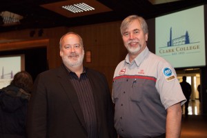 Presidential Coin recipient and Automotive Technology professor Mike Godson, right, with Dick Hannah representative Gary Schuler. Godson and Schuler worked together to help create a partnership that allows aspiring automotive technicians to take classes at Clark College and work at Dick Hannah simultaneously.