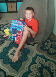 Smiling boy with backpack