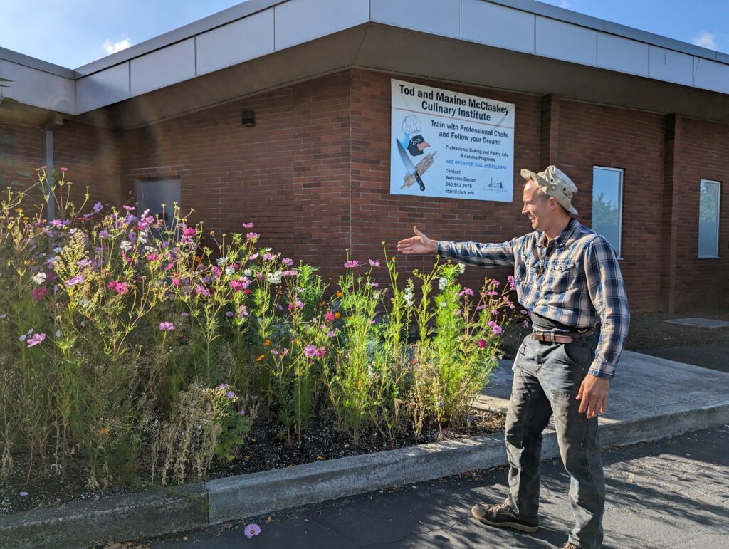 Chef Sonny inspects the wildflowers that attract pollinators to the garden.