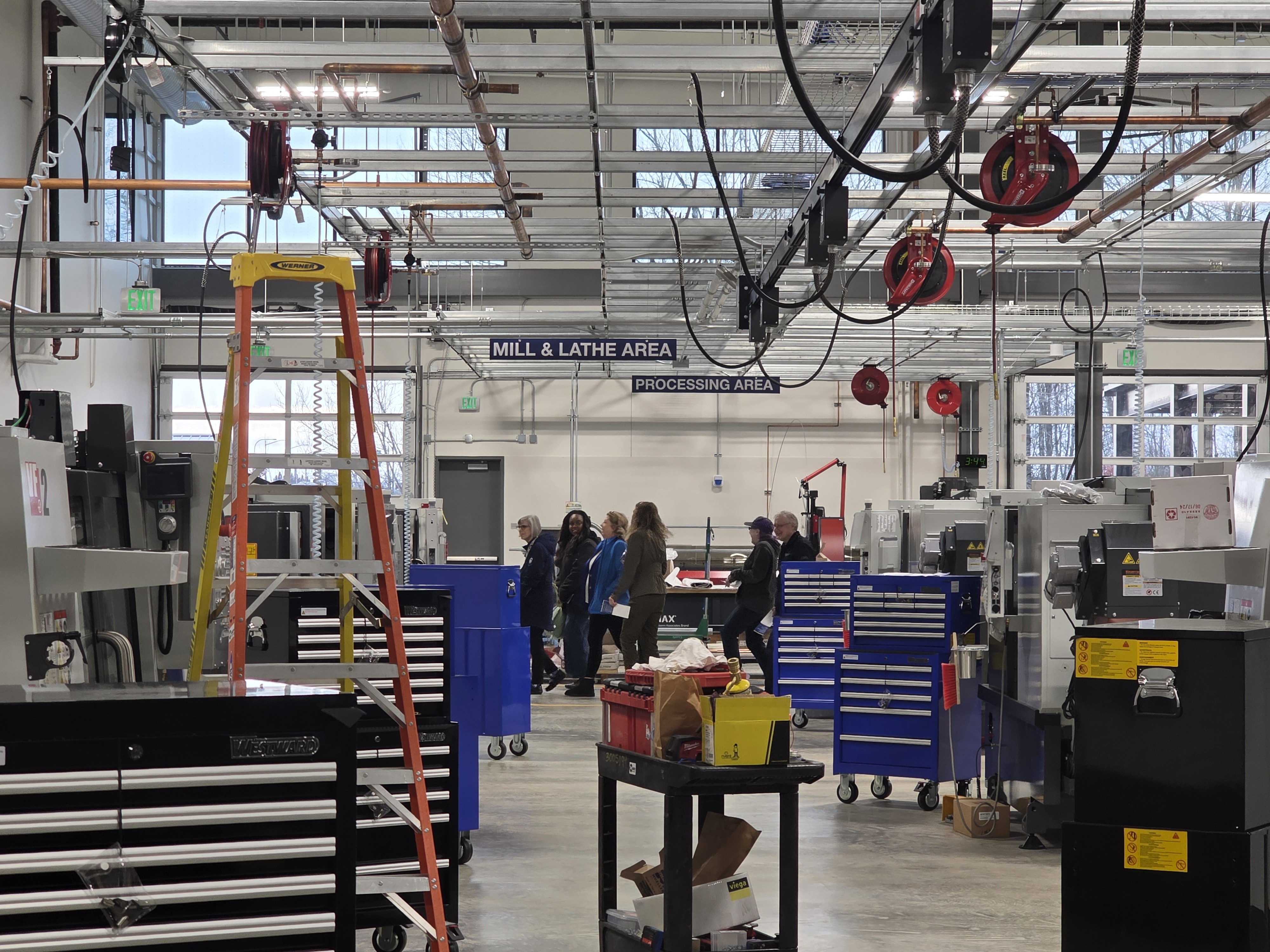 A group of attendees walks through the Learning Lab at Clark's newly opened AMC