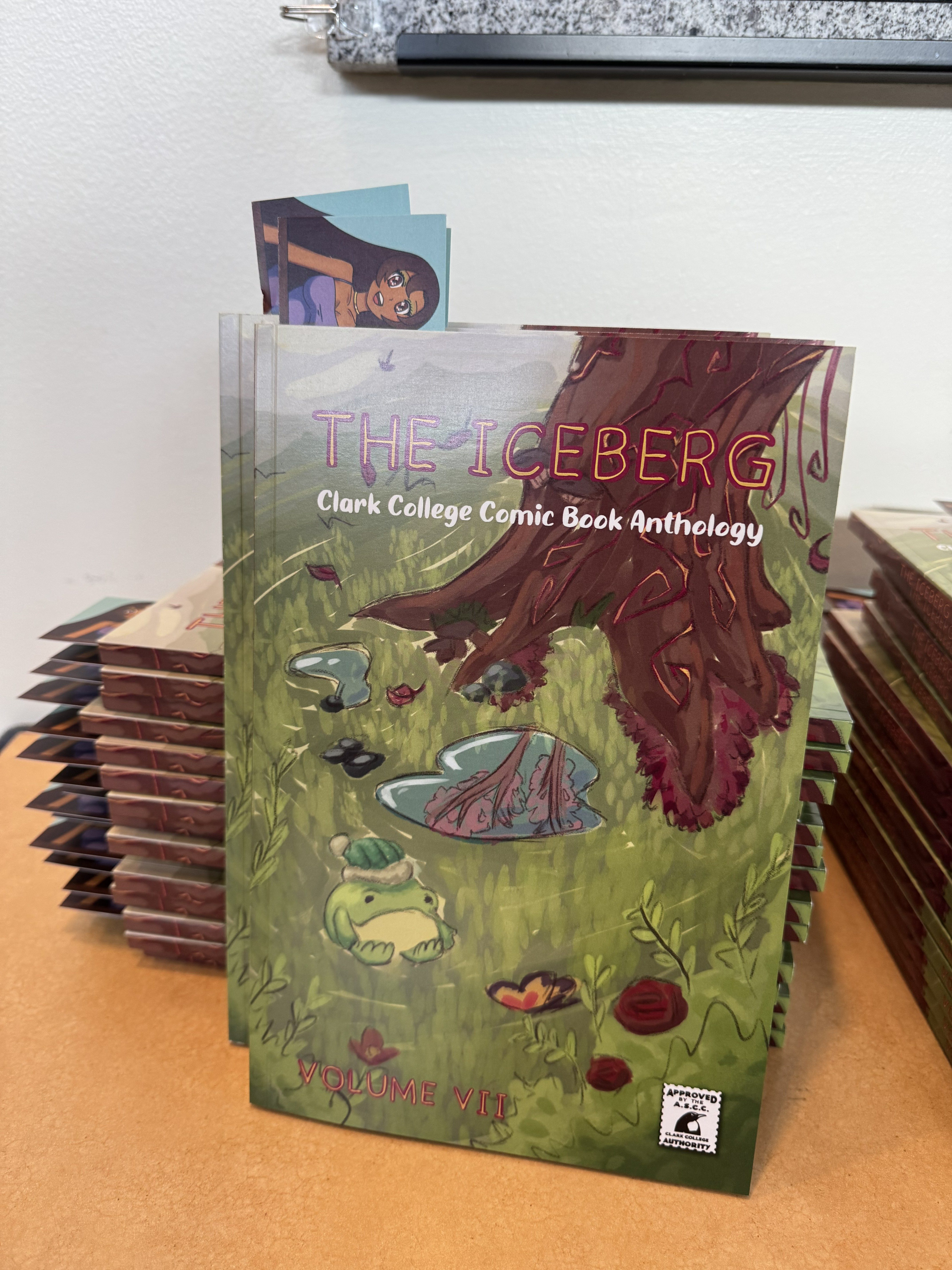 The Iceberg comic book anthology with a cover featuring a tree trunk and a frog