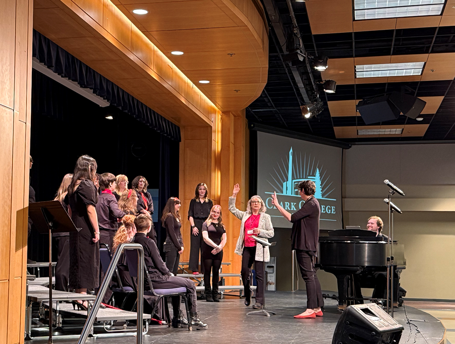 April Duvic clinics the ACMA choir with director Kendra Symonds