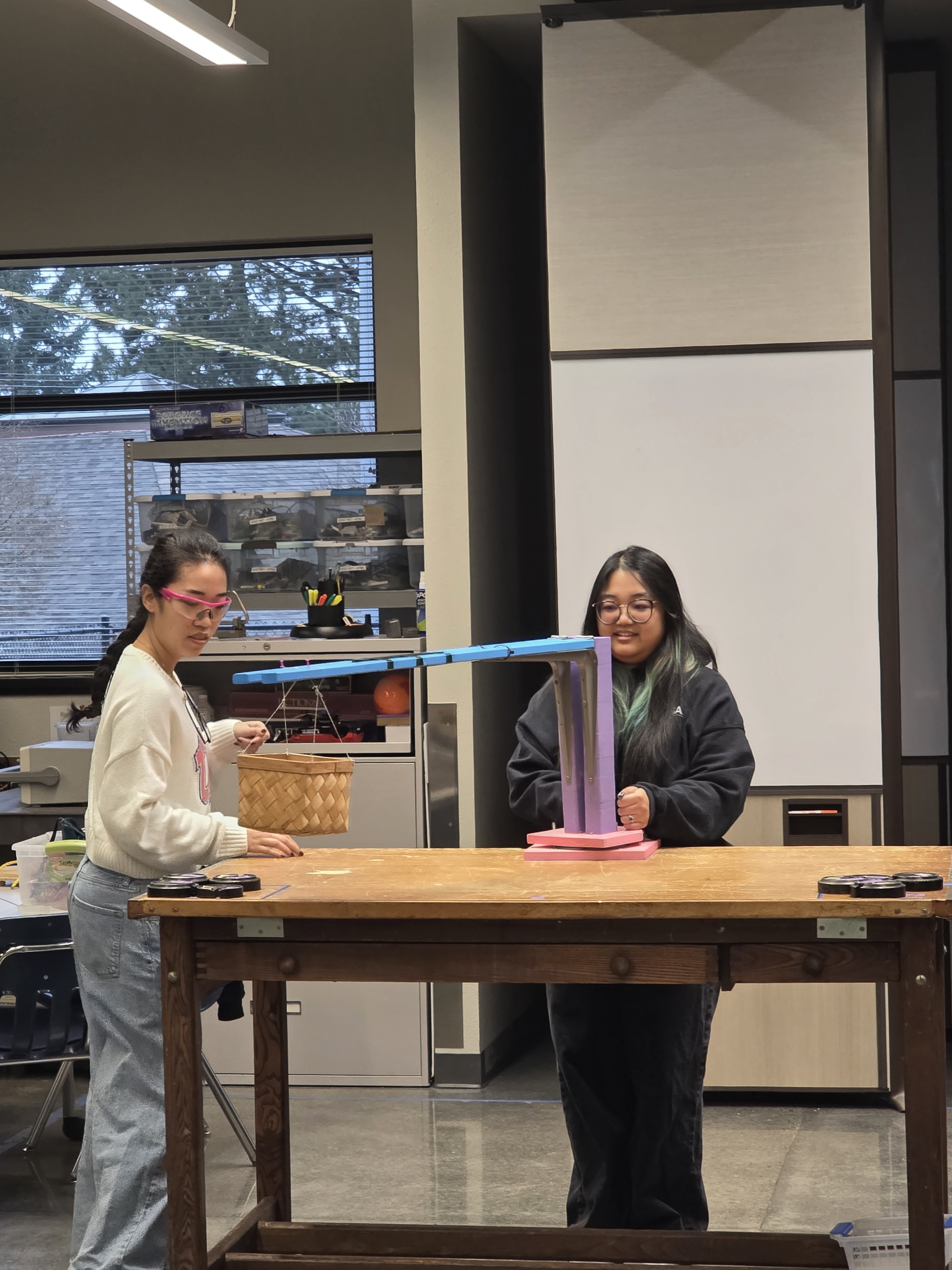 Students operating a crane