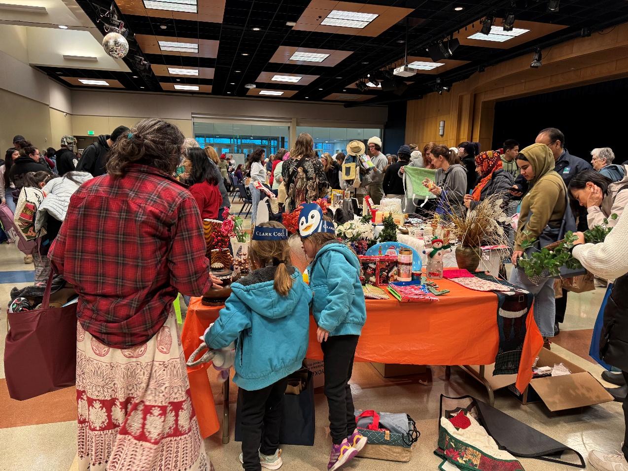 Students and their families browse donated items at Gaiser Hall