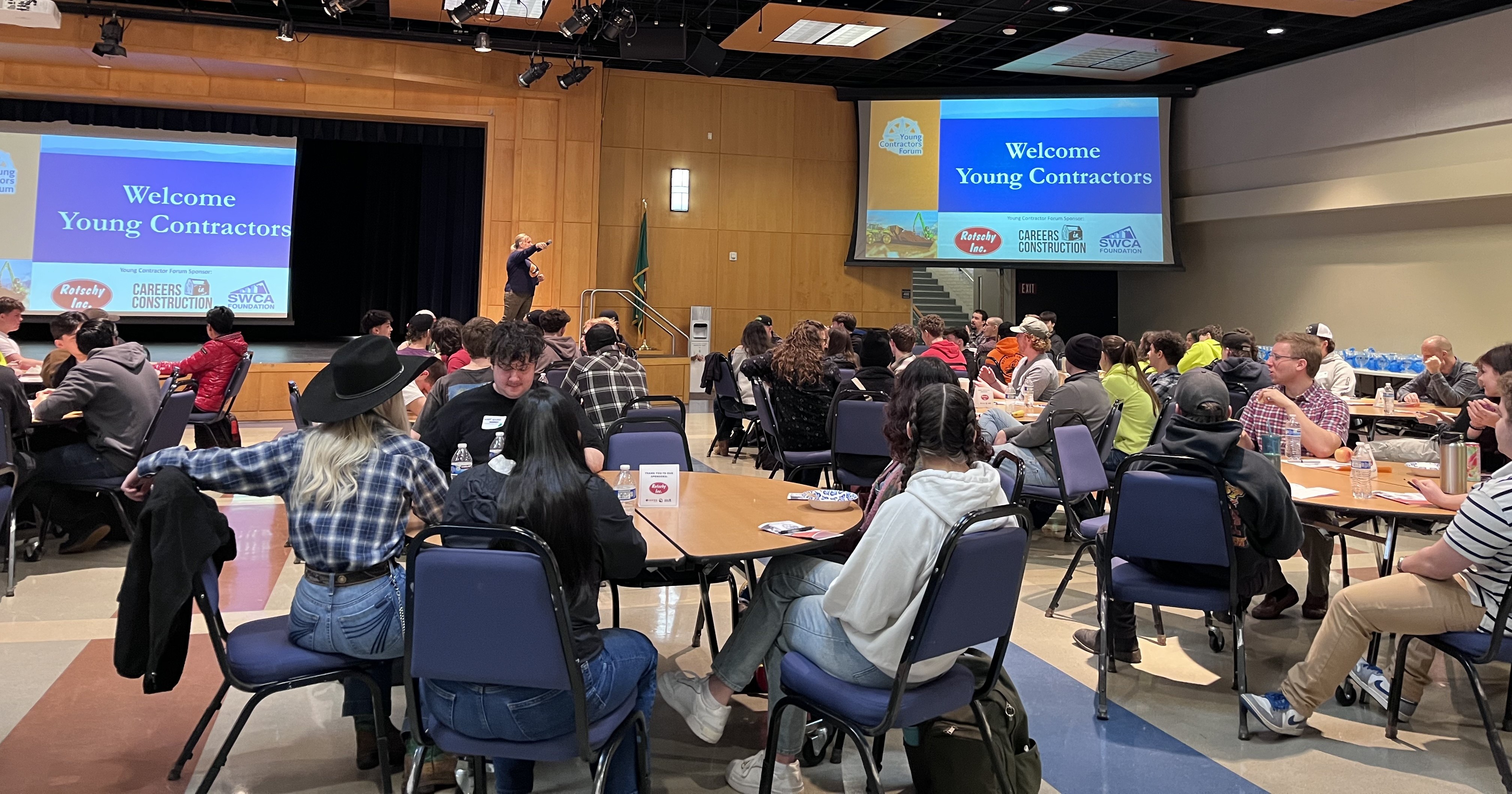 High school students sitting at tables in Gaiser Hall during Young Contractors Forum