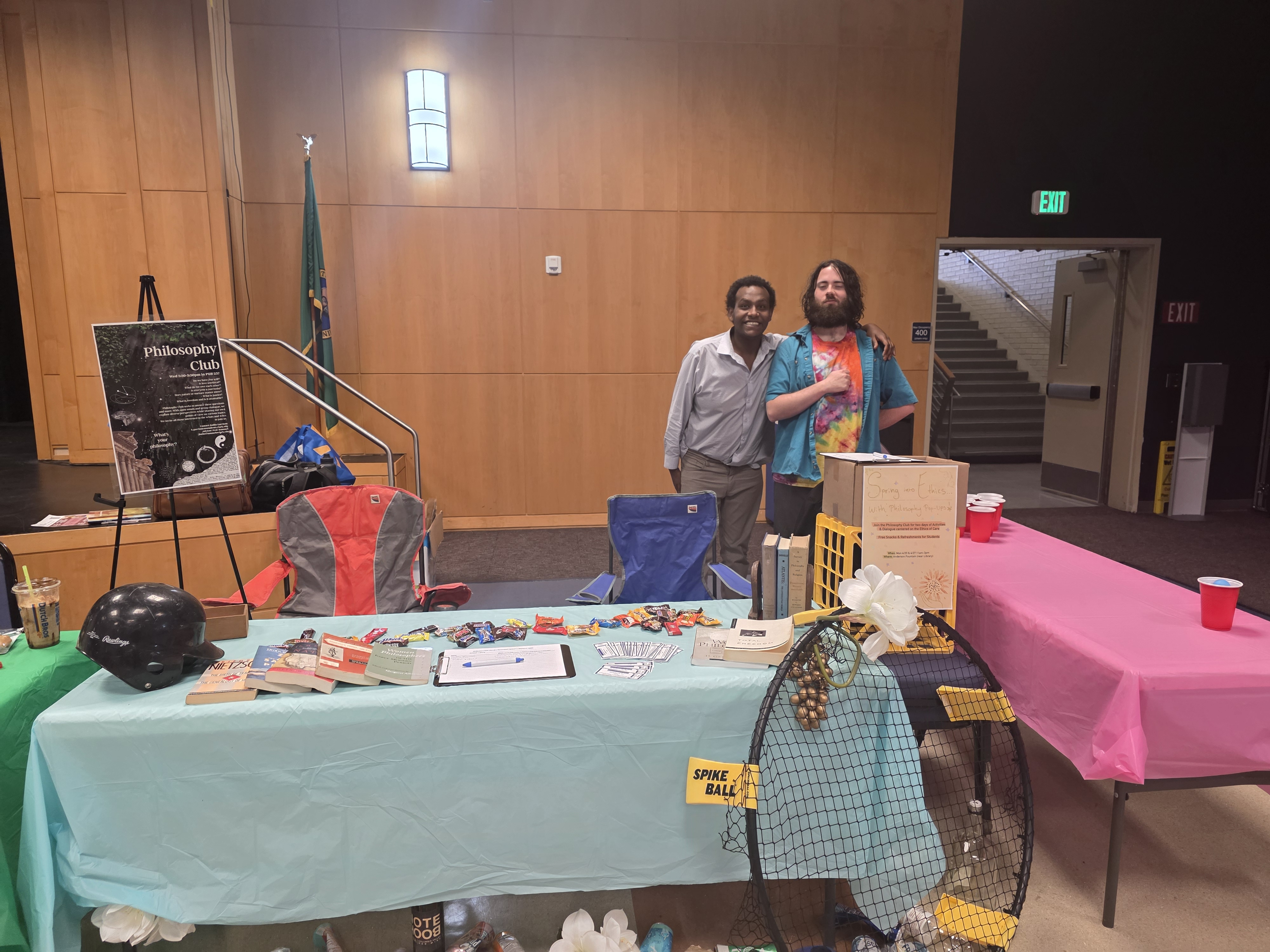 Students standing behind the Philosophy Club table