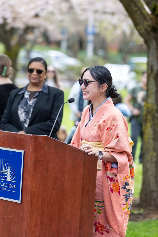 International student Namika Miyagi addresses the crowd dressed in a traditional kimono