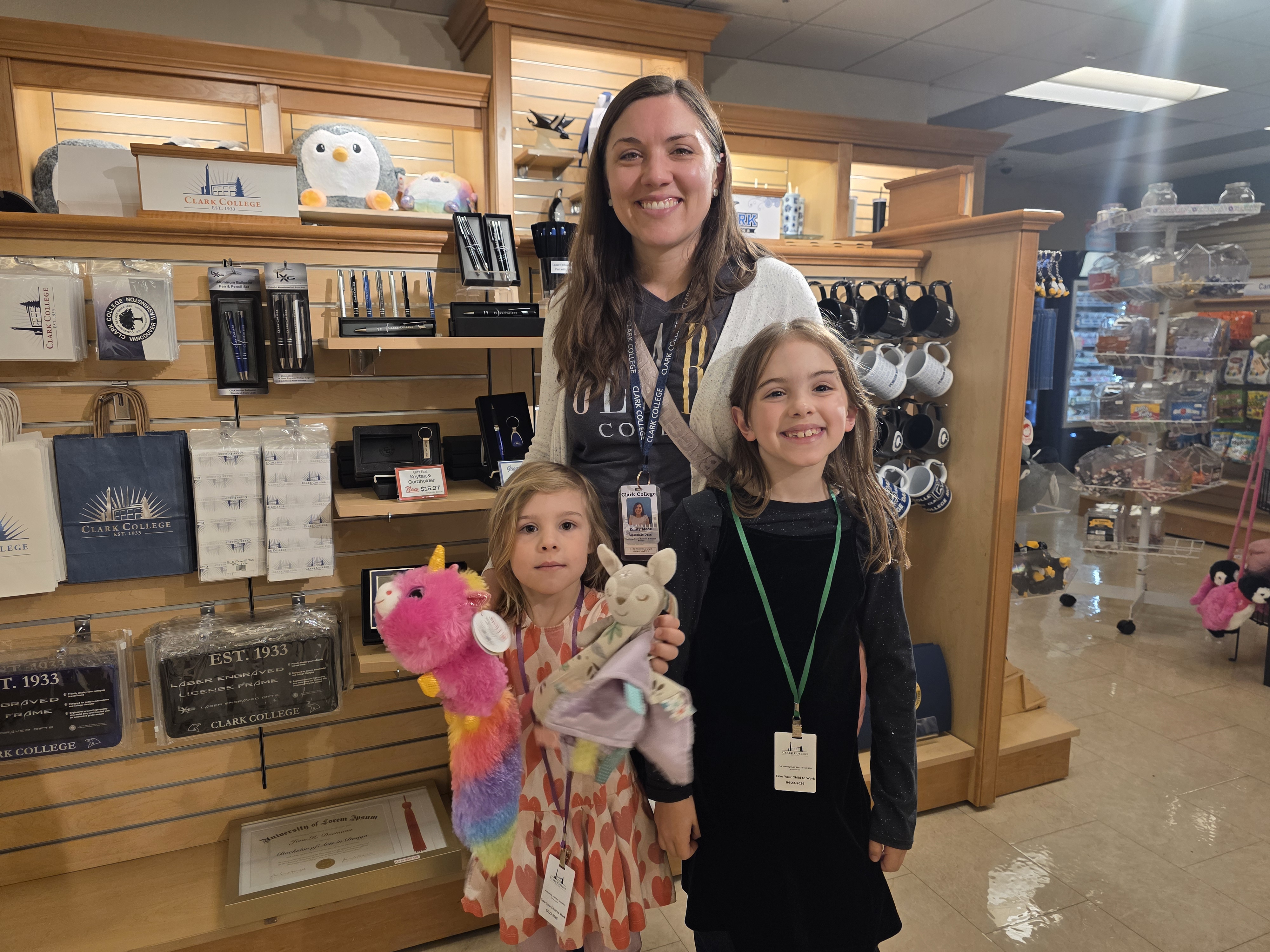 A Clark employee and her daughters in the bookstore