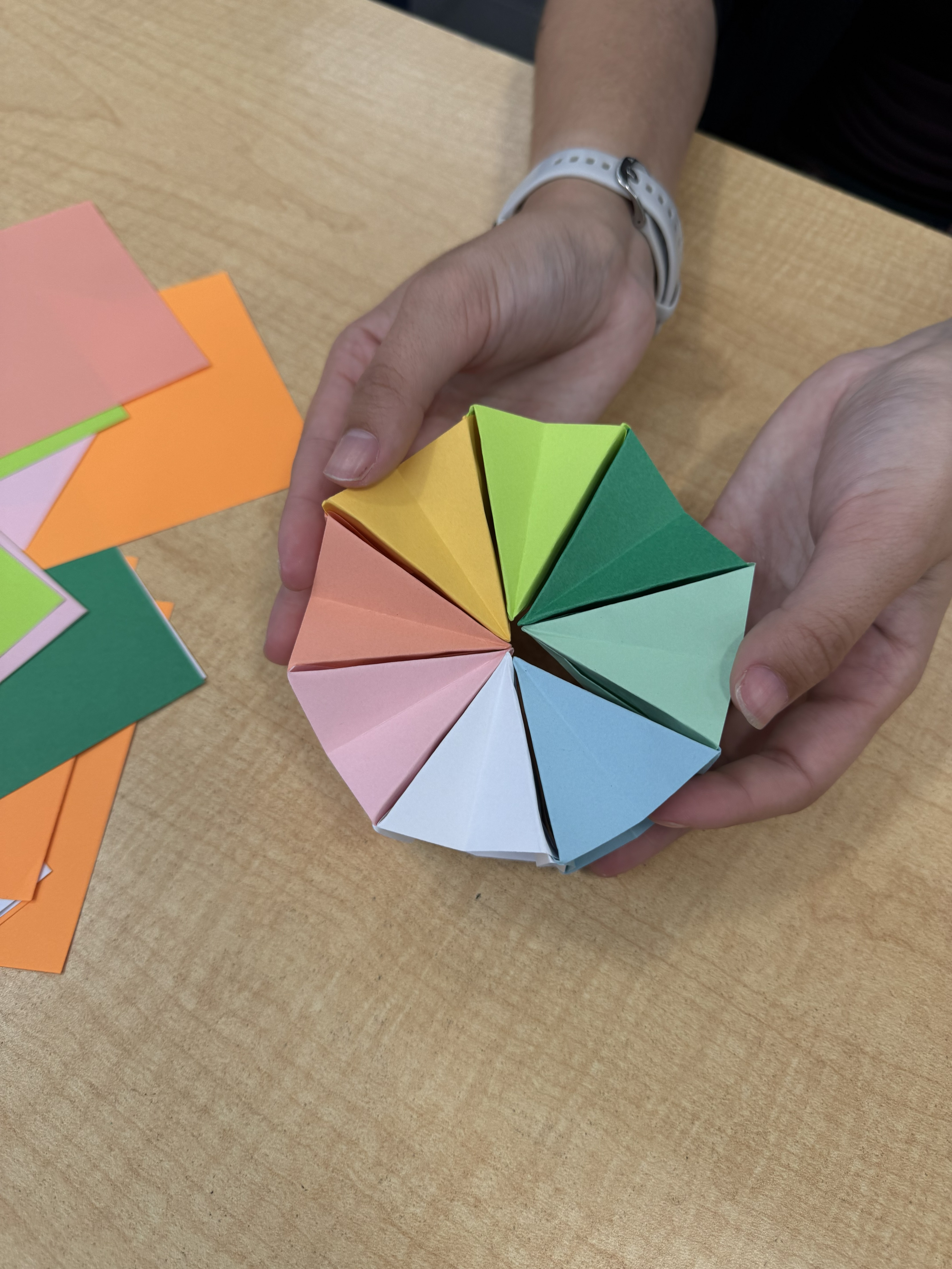 Colorful papers folded into a pattern