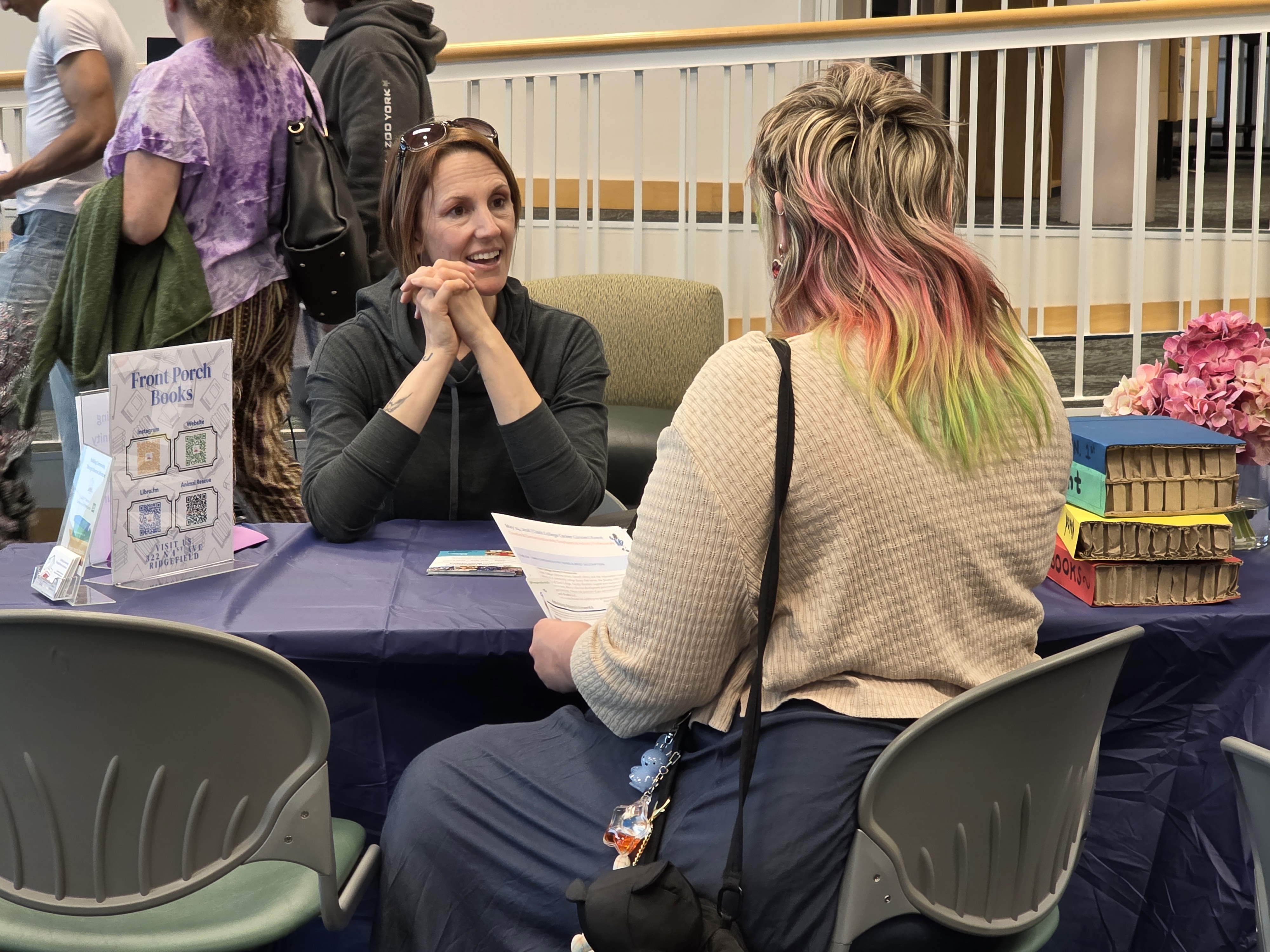 Vendor speaking with a student