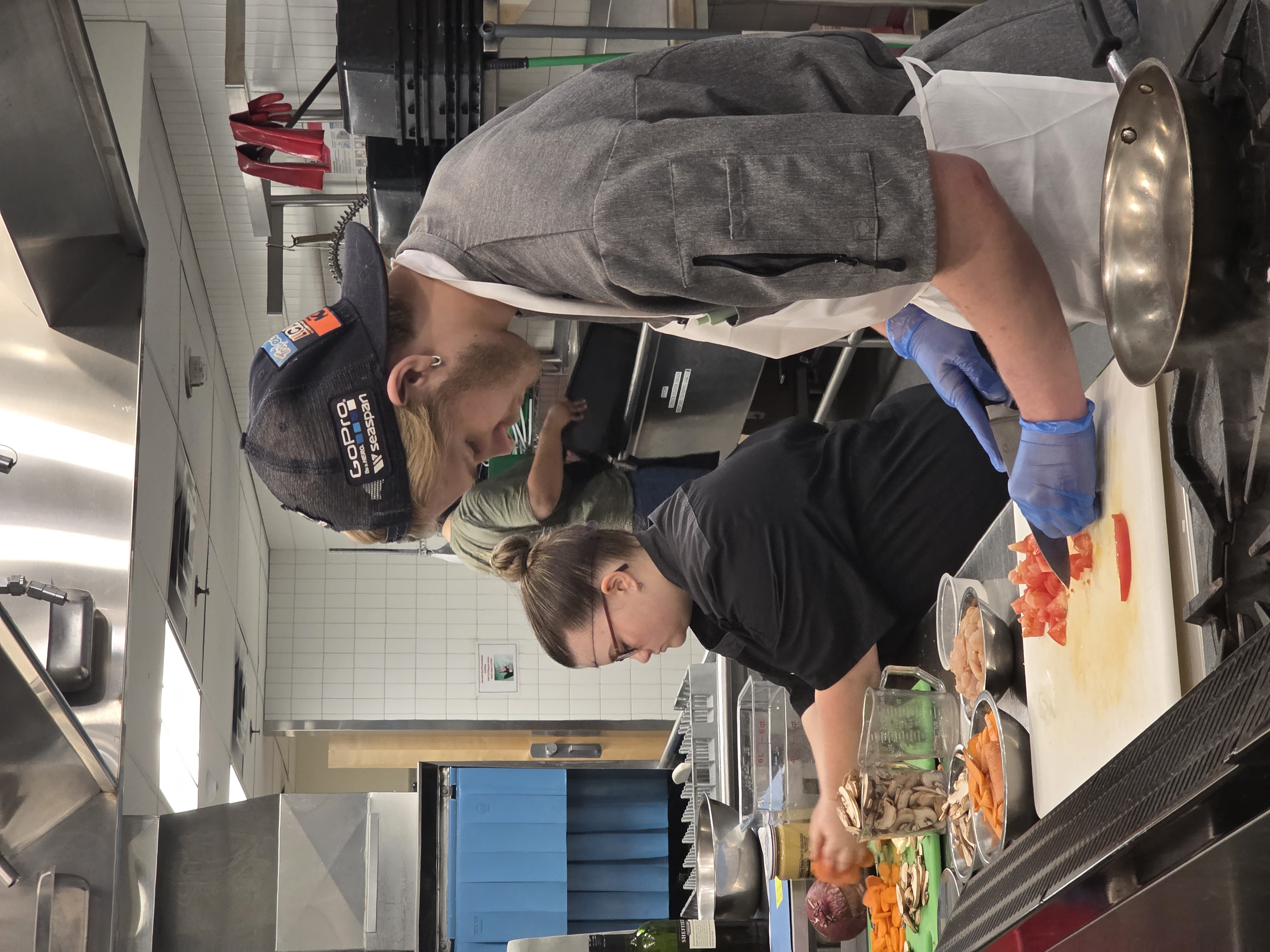 High school students cooking at MCI competition