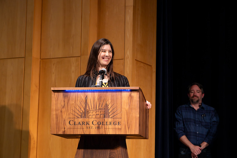 Nicole Mottier speaking at the podium during tenure reception