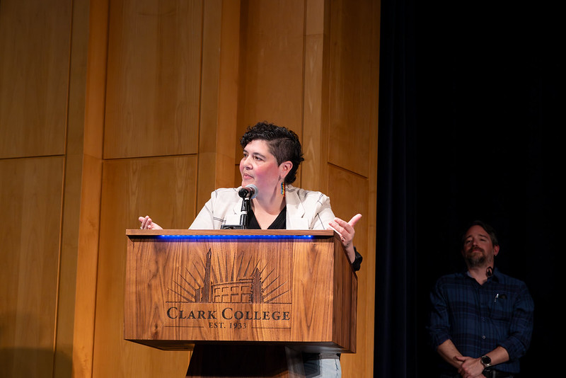 Sarah Blanchette speaking at the podium during tenure reception