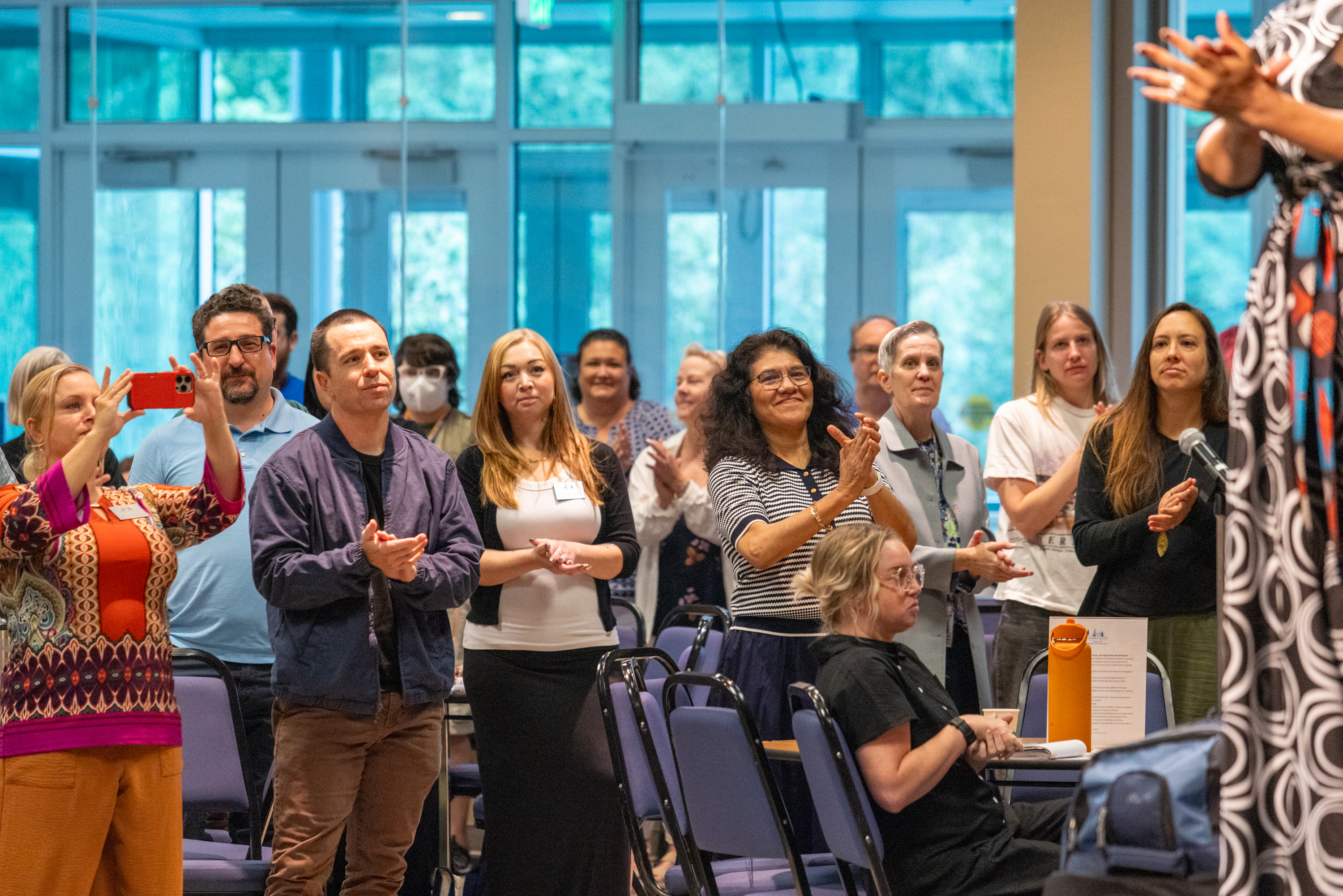 People standing in the audience at Gaiser Hall