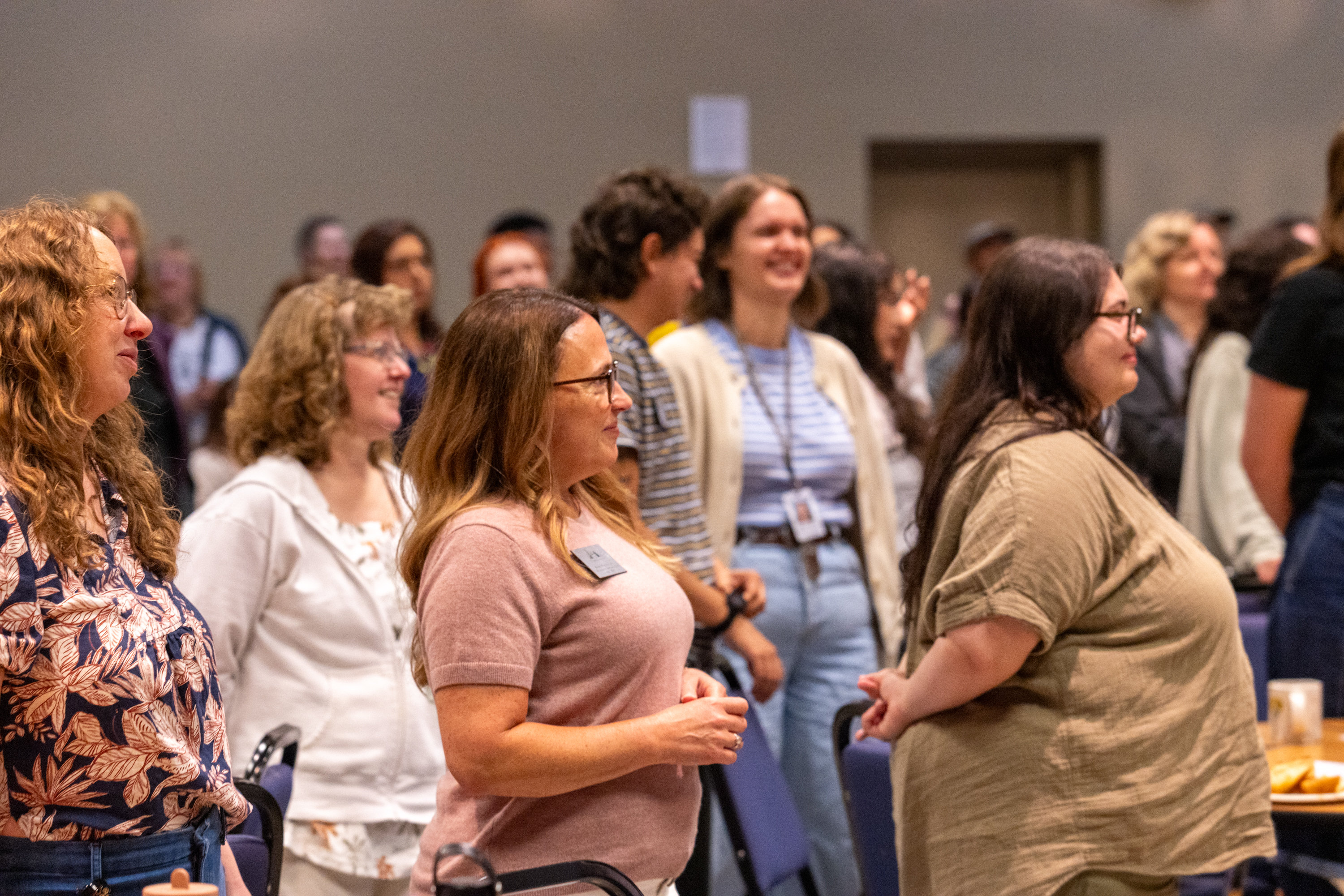 People standing in the audience at Gaiser Hall