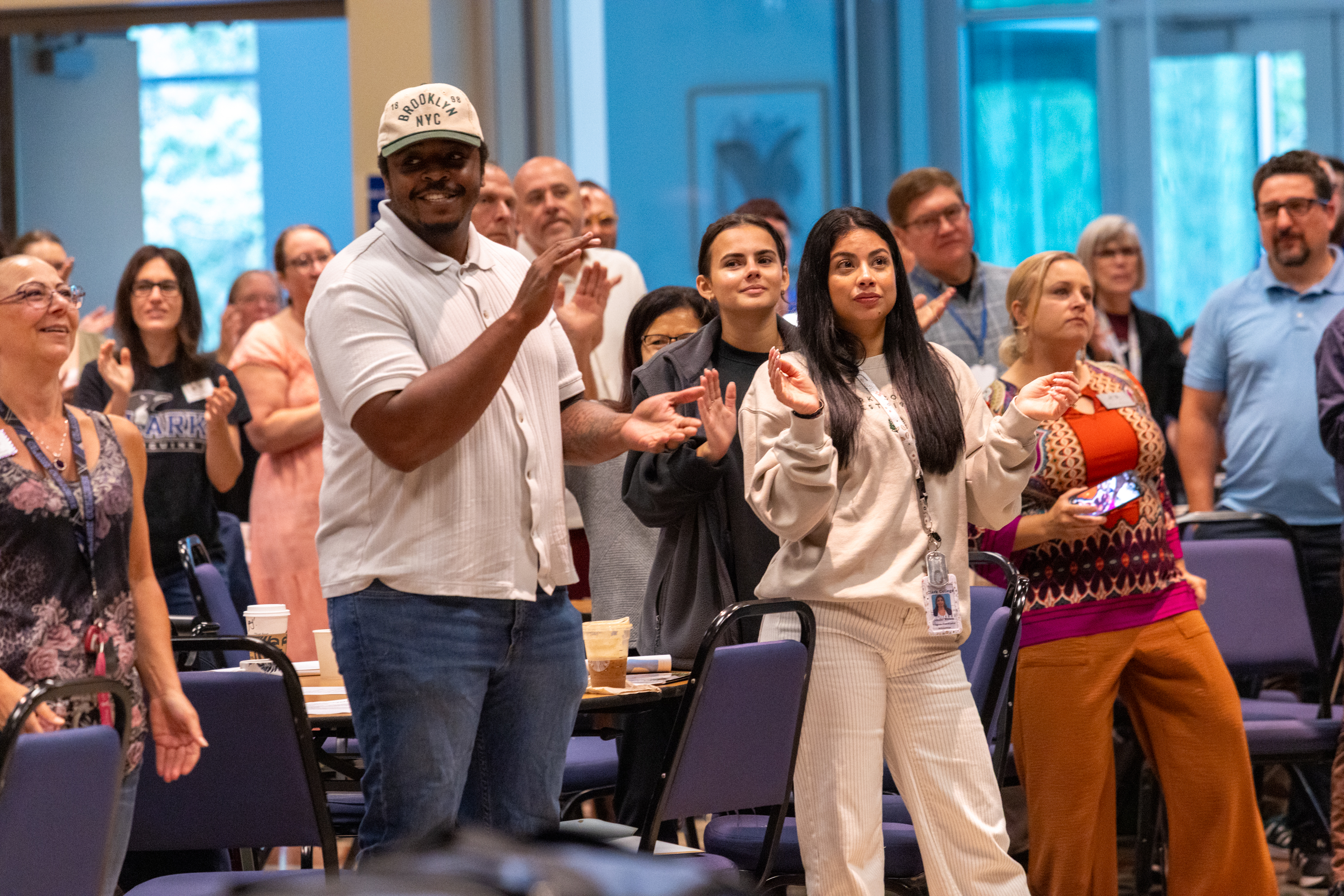 People standing in the audience at Gaiser Hall