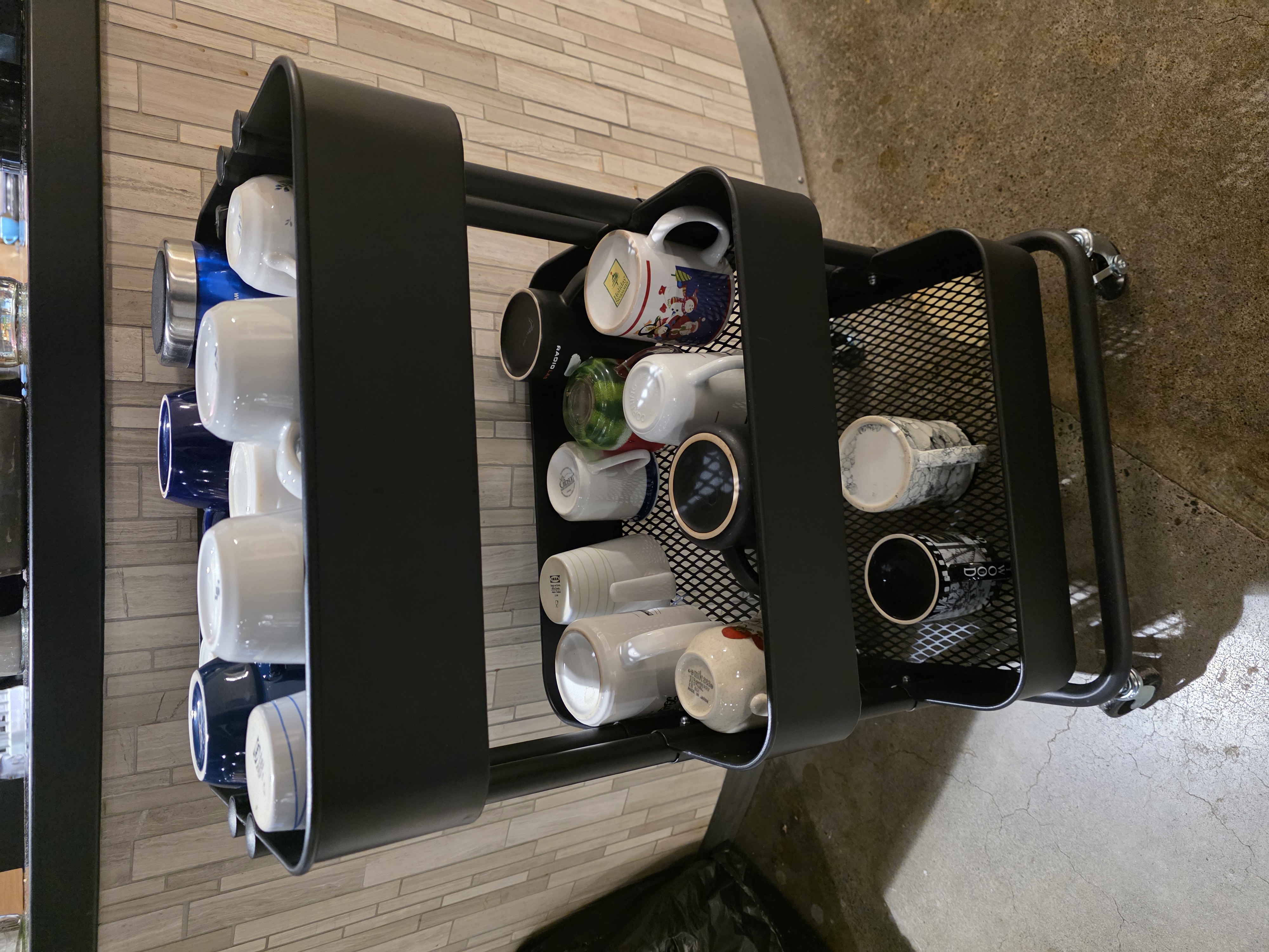 Cart filled with reusable mugs