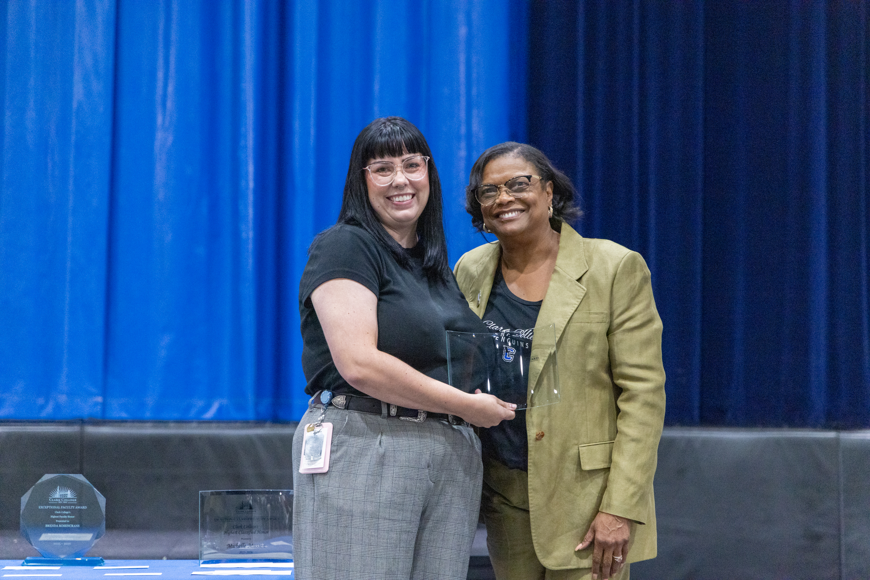 Lindsey McKim holds her award next to Dr. Edwards