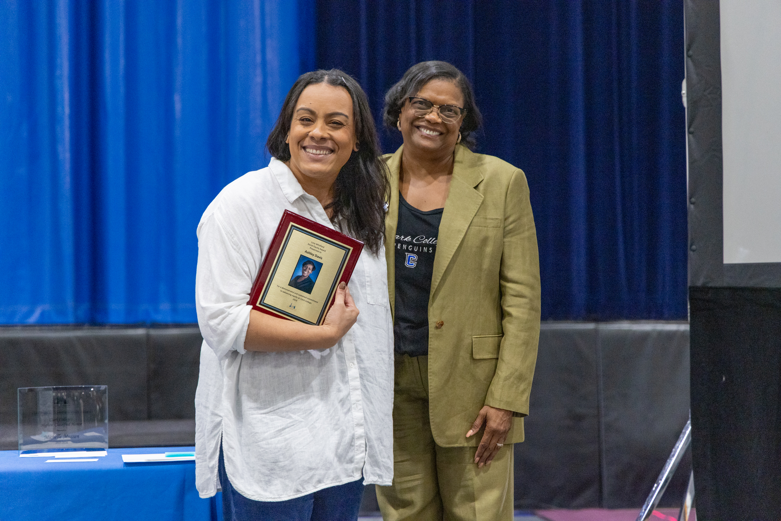 Ashley Davis holds her award with Dr. Edwards