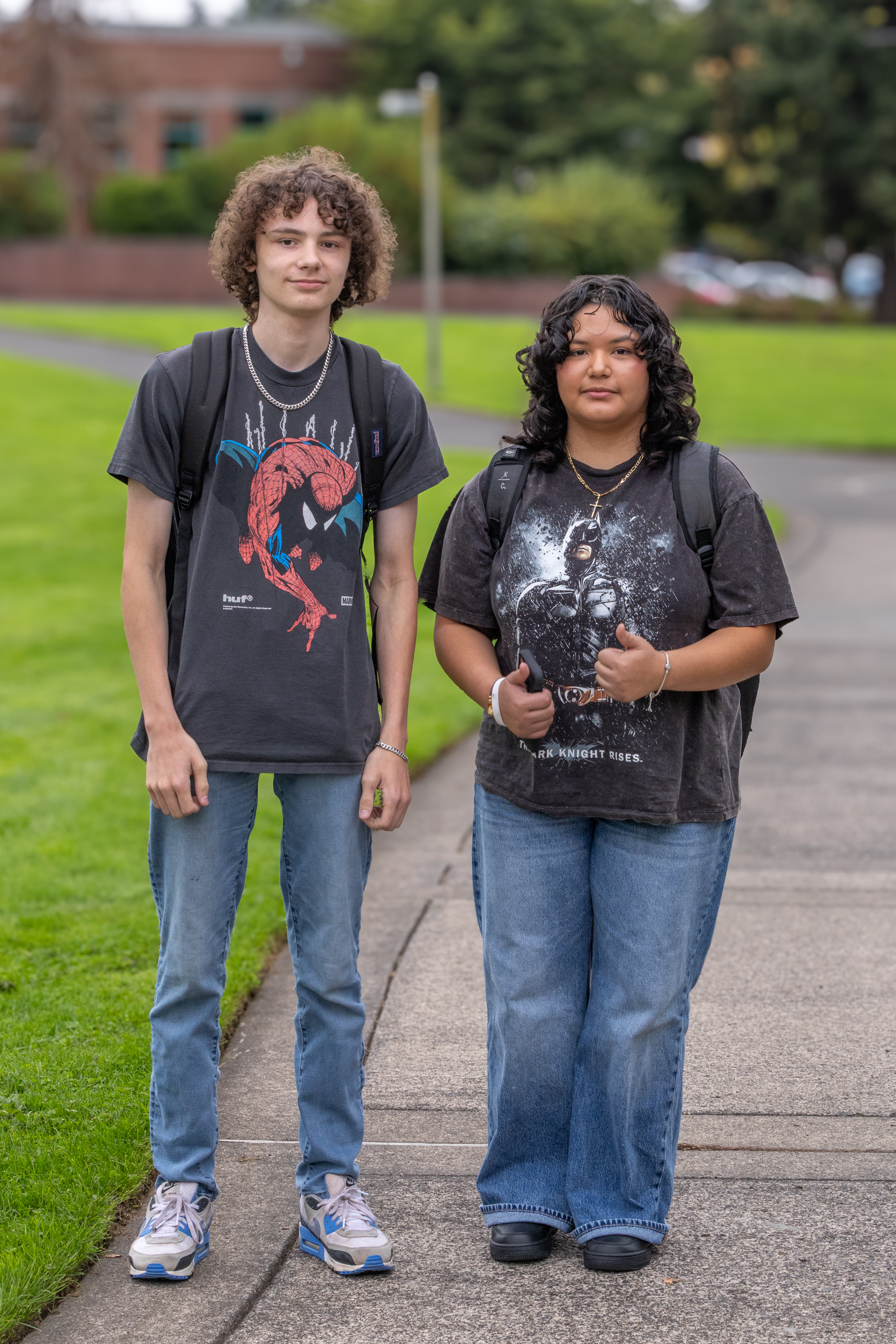 Two students stand together