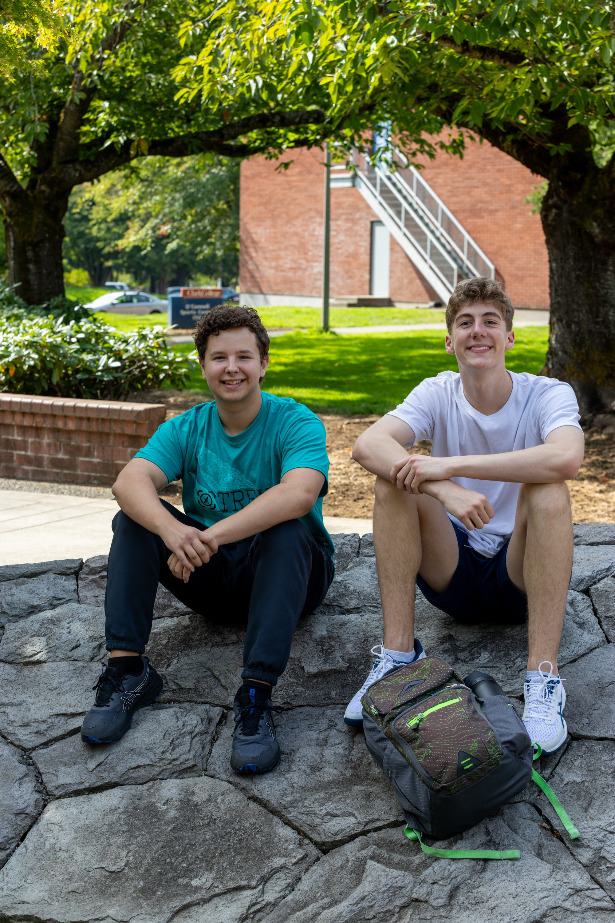 Two students sit together in Friendship Garden