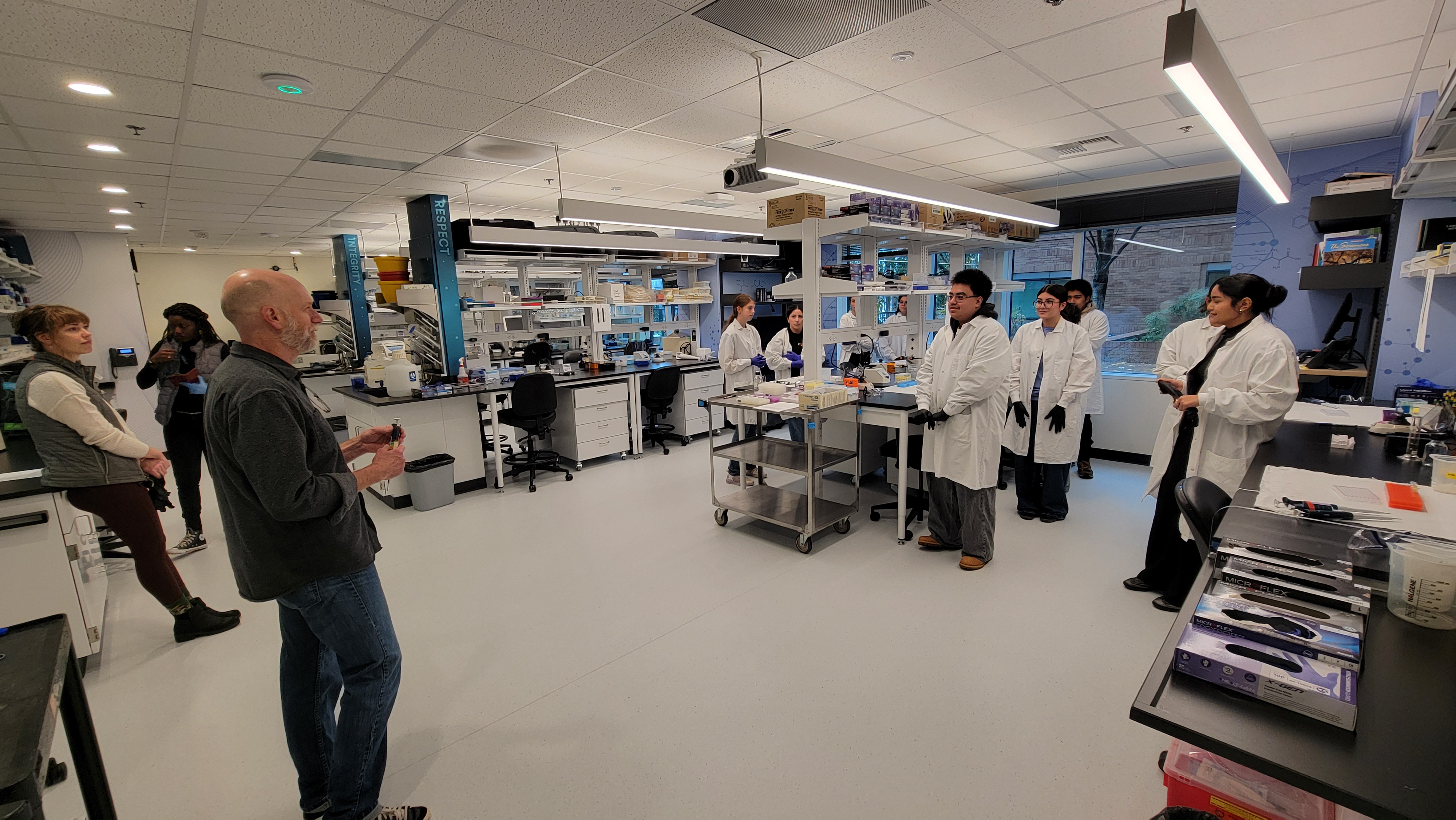 Students standing in research lab