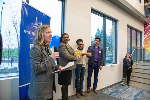 Mortenson's Market Director Carolyn Sizemore gives a talk during the opening ceremony for the Advanced Manufacturing Center.
