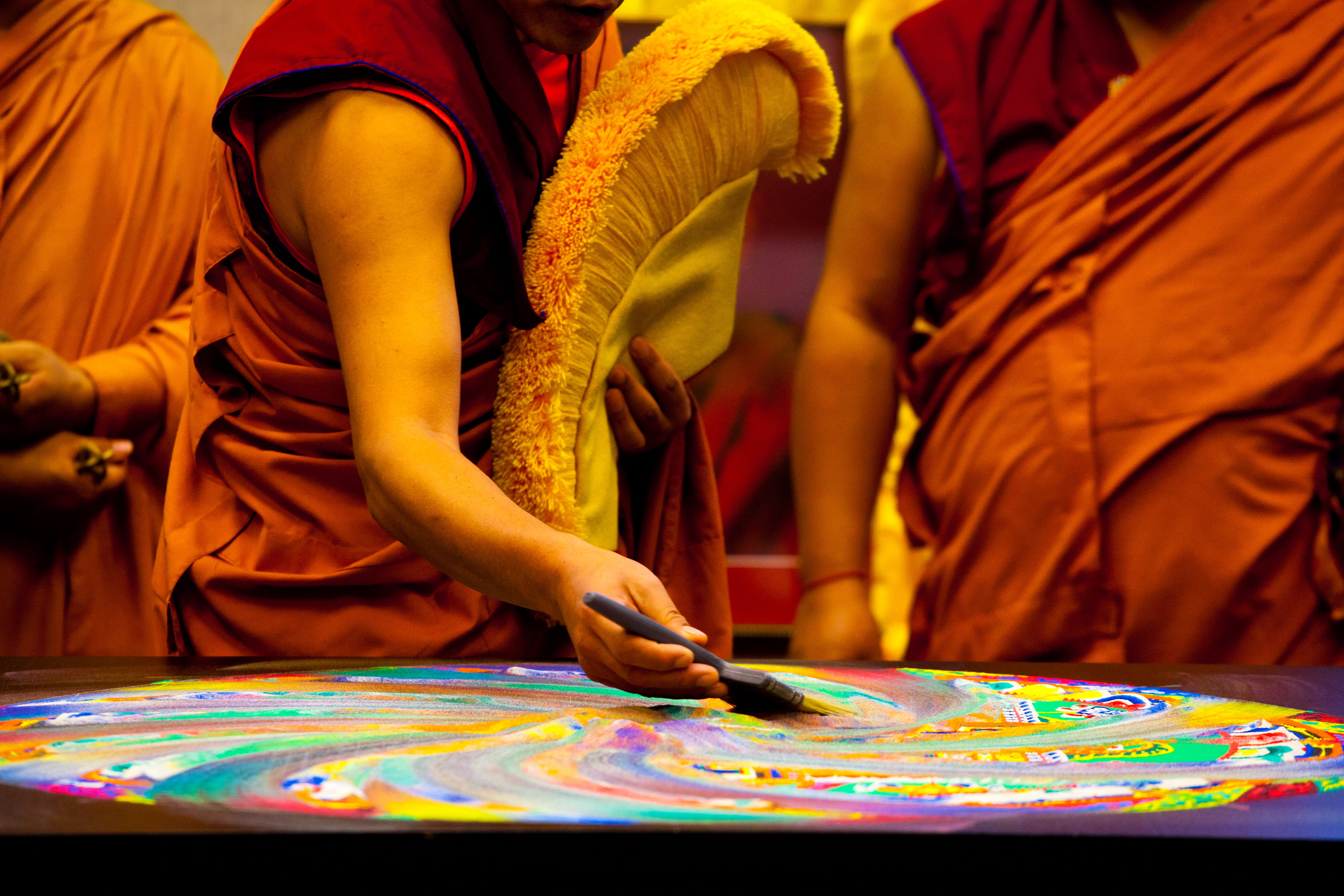 Monks destroying sand mandala