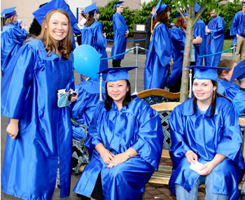 Graduates smile