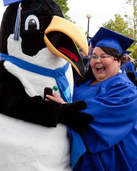 Presidential Scholarship recipient Sheila Henrikson and Clark  mascot Oswald