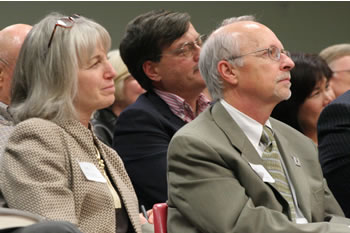 Clark College Trustees Addison Jacobs and John White listen intently to David Gergen's keynote address. 