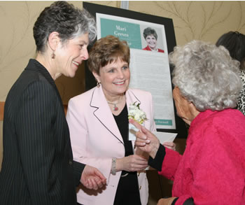 Mari Greves receives congratulations on being named a 2007 Woman of Achievement. 