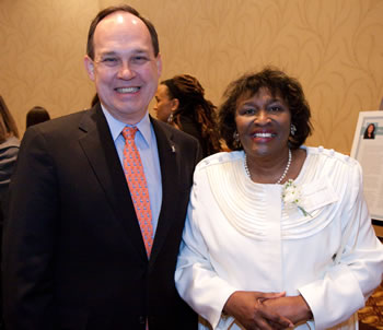 Clark College Board of Trustees Vice Chair Jack Burkman congratulations 2010 Woman of Achievement Rev. Marva Edwards.