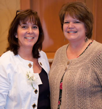 Woman of Achievement Nancy Simmons receives congratulations from Barbara Miller, Executive Assistant to the Vice President of Instruction at Clark College