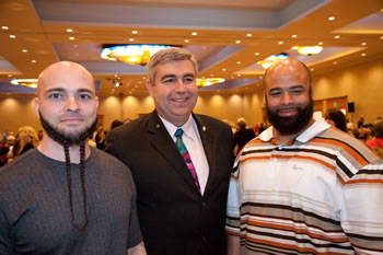 Left to right:  Gary Warden, Clark President Bob Knight and Randall Henderson. After leaving Larch, Warden and Henderson each received scholarships and are attending Clark College. 