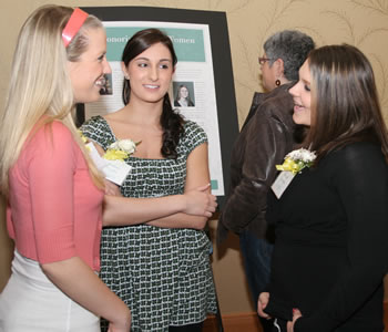 Recipients of the YWCA's Community Service Award receive congratulations from family and friends. 